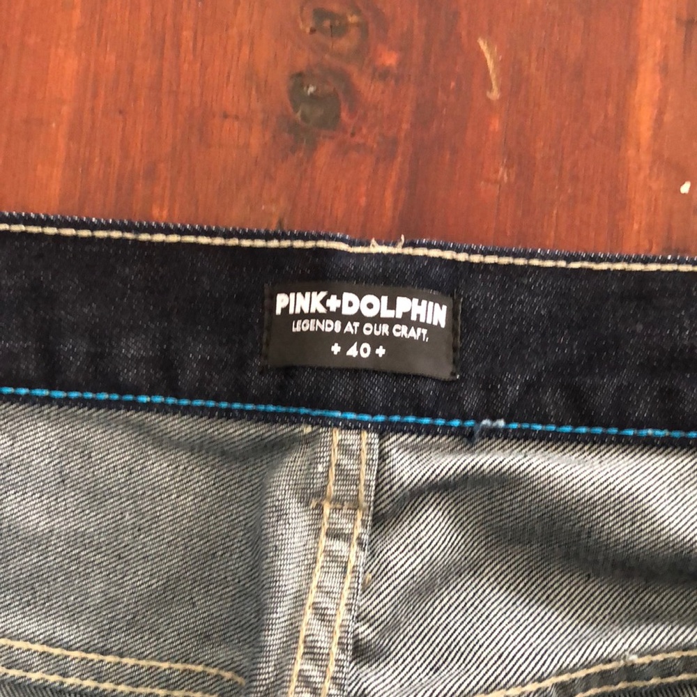 Never worn Pink Dolphin Jeans.